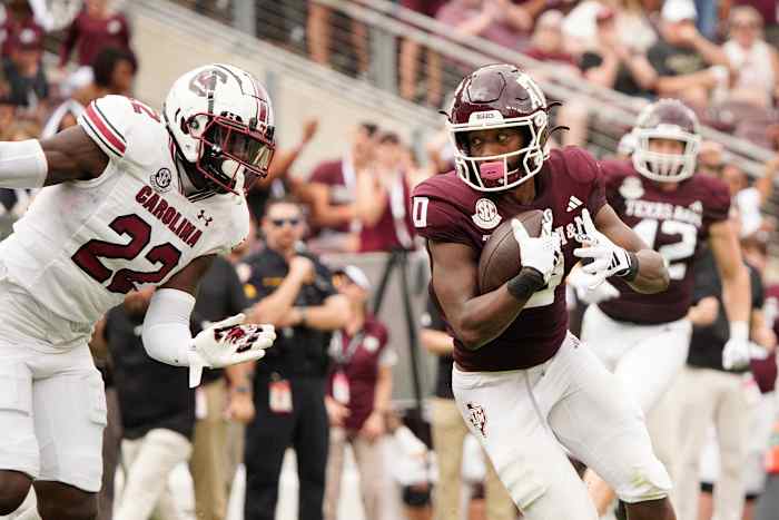 Bam Martin Scott trying to tackle A&M receiver Ainias Smith (28th Oct., 2023)